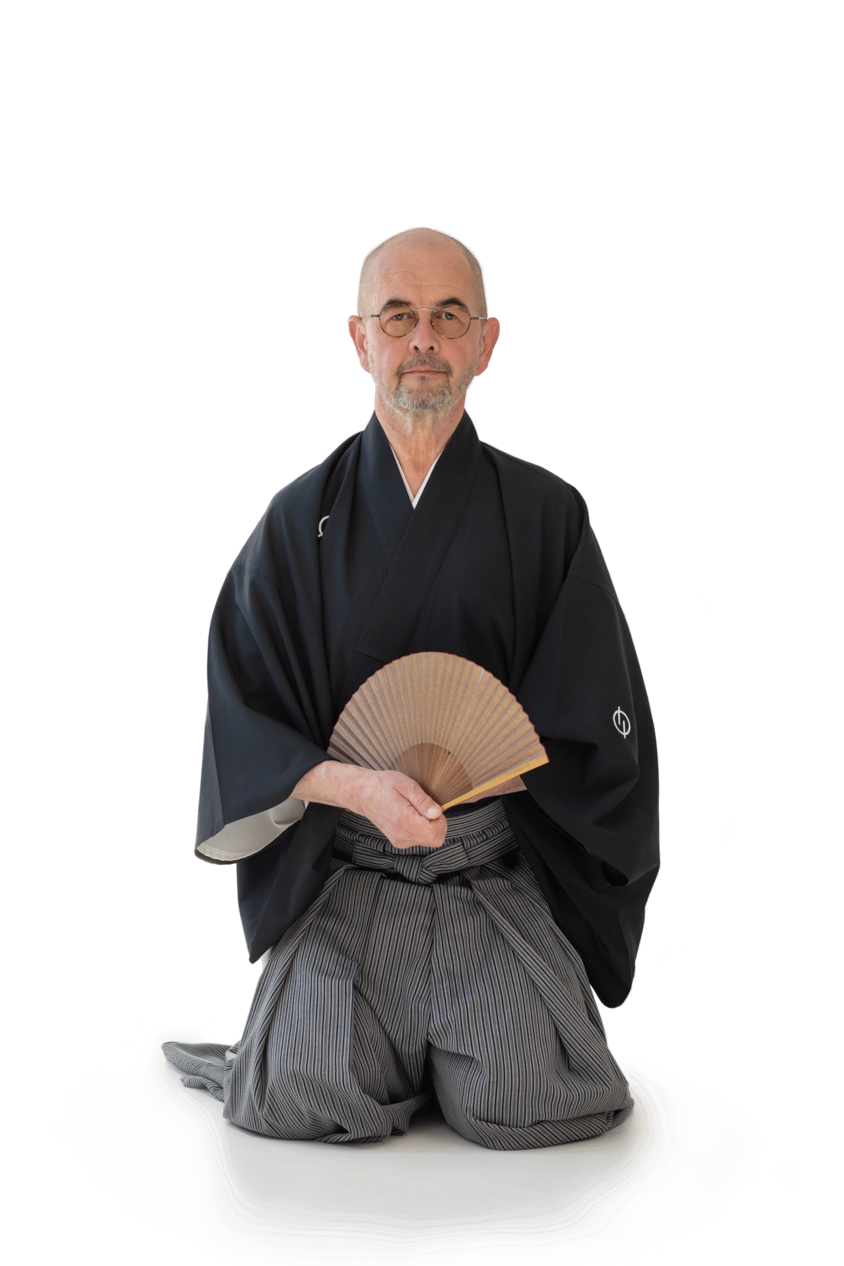 zdjęcie pan siedzący z wachlarzem